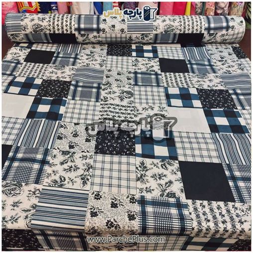 پارچه ملحفه ای گل دار با گل سورمه ای (طرح چهل تکه)  با زمینه سفید و سورمه ای