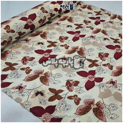 پارچه ملحفه ای گل دار با زمینه کرمی و طرح پروانه