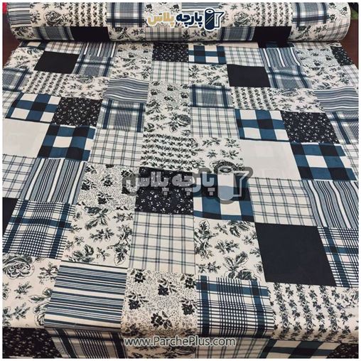 طاقه پارچه ملحفه ای پلی استر (پرنسس)  گل دار با گل سورمه ای (طرح چهل تکه)  با زمینه سفید و سورمه ای